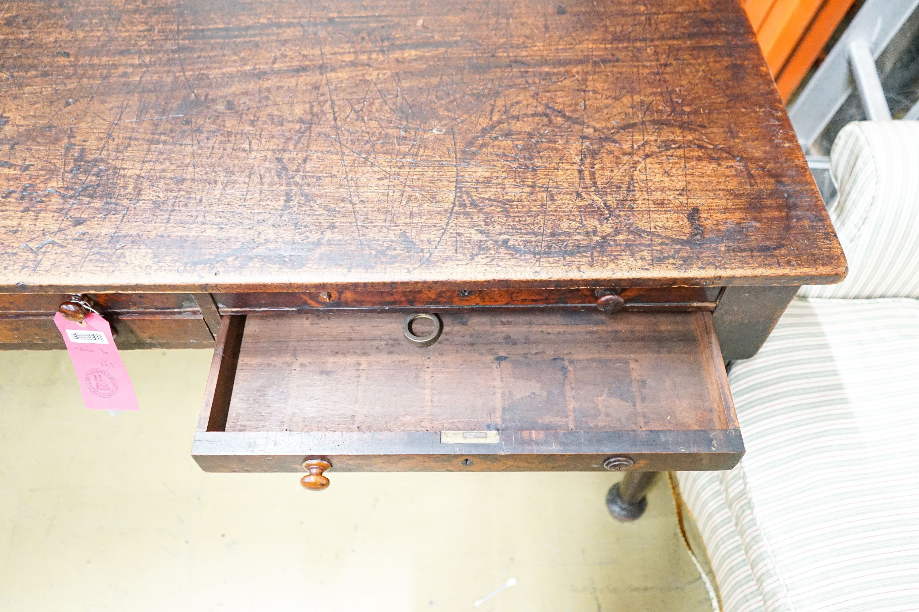 A Victorian mahogany library table from the Library of the Royal College of Surgeons, London, length 168cm, depth 90cm, height 74cm